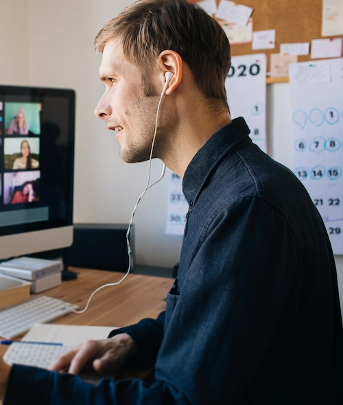 man working at desktop